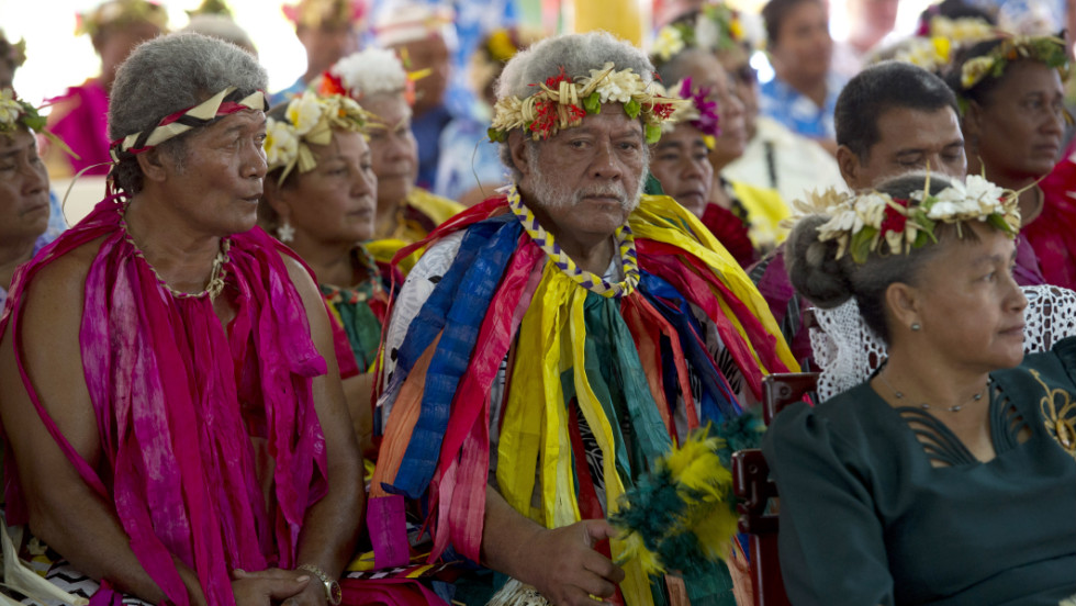 Local participants watch as the duke and duchess conclude the portion of their trip in Tuvalu on Wednesday.