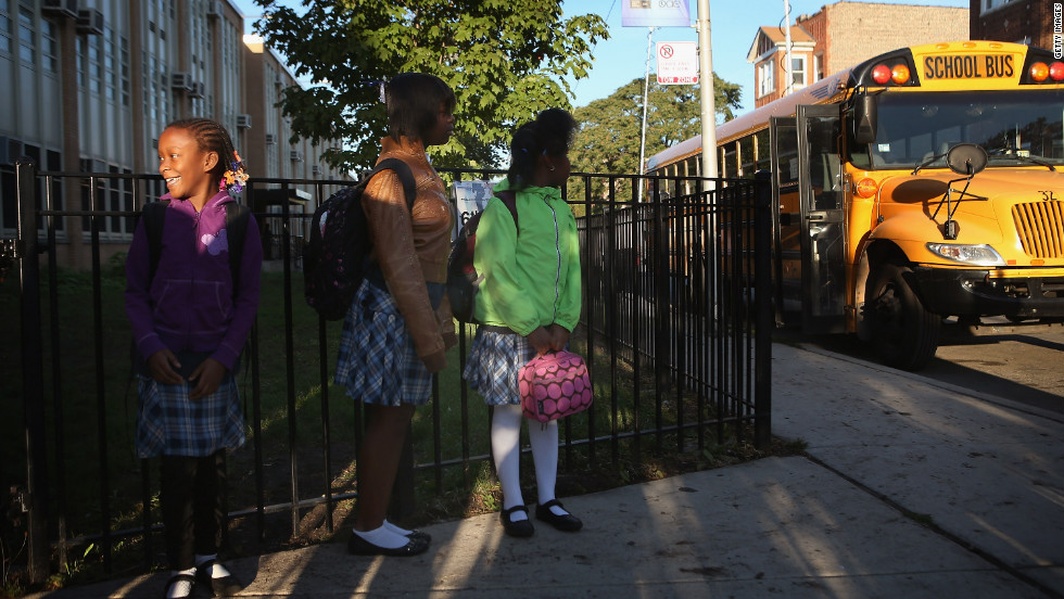 Students at Frazier International Magnet School wait outside before the start of classes Wednesday. Teachers and students had been out of school since the strike began on September 10.