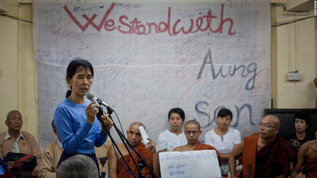 Suu Kyi speaks in Yangon in December 2010, a month after being released from house arrest. She had spent 15 of the previous 21 years under house arrest.