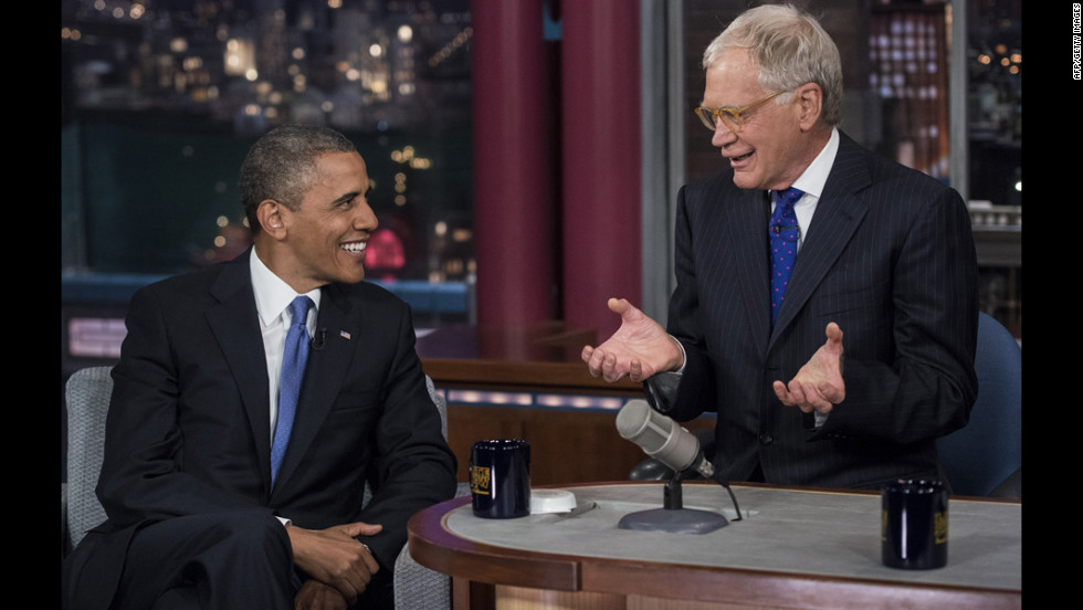 Obama and David Letterman speak during a break in the taping of the &quot;Late Show with David Letterman&quot; on Tuesday, September 18, at the Ed Sullivan Theater in New York.