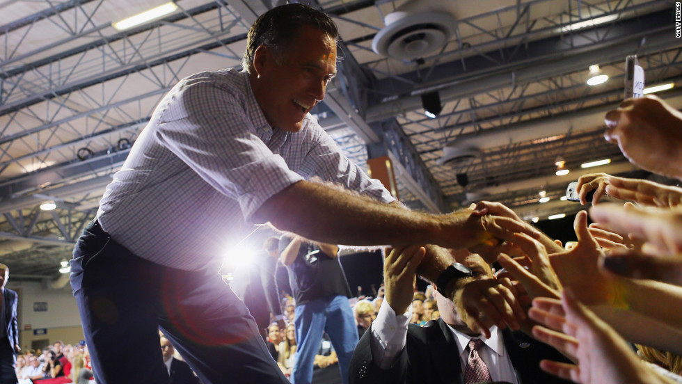 Romney shakes hands with supporters during the Juntos Con Romney Rally in Miami on Wednesday.