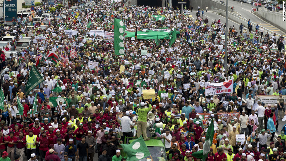 Malaysian Muslim demonstrators march toward the U.S. Embassy after a Friday mass prayer in Kuala Lumpur.