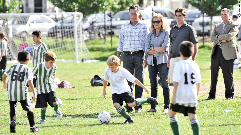 From left to right: Romney, his wife Ann, and son Tagg watch one of Tagg&#39;s sons play soccer in Belmont, Massachusetts, on Saturday, September 15.