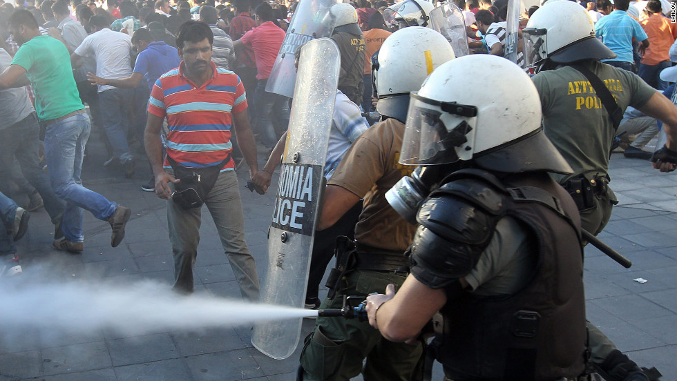 Riot police clash with demonstrators in Athens, Greece, on Sunday, September 23. 