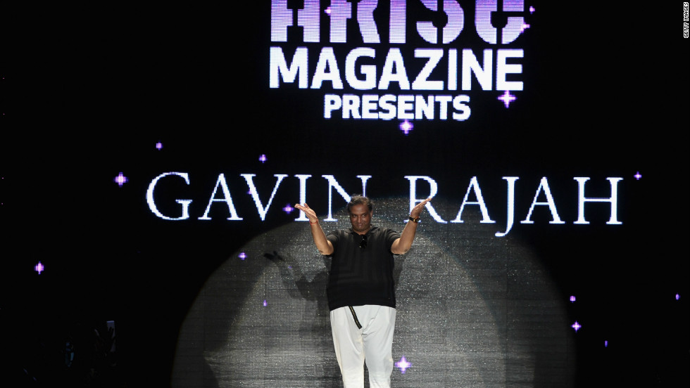 South African designer Gavin Rajah walks the runway at the Lincoln Center.