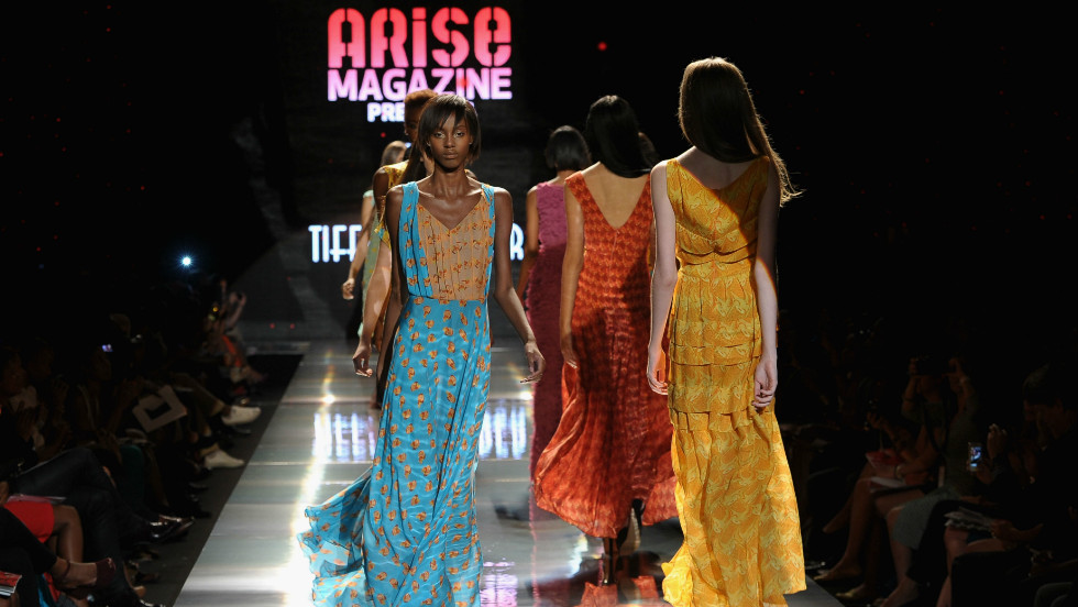 Folake Folarin-Coker&#39;s creations for Tiffany Amber &quot;offered up floaty resort-wear with decadent 1970s overtones,&quot; according to Jennings. &quot;Entitled The Rhythms Of Africa, jewel-coloured silks were hand printed with drum motifs and formed waist-cinching maxi dresses, jumpsuits and rompers.&quot; 