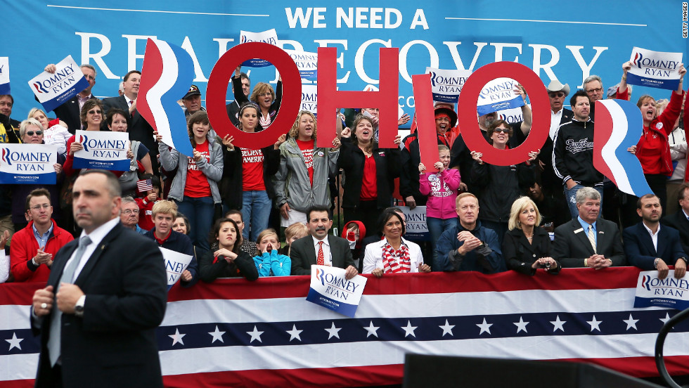 Supporters cheer during a Republican campaign rally Tuesday with Romney and his running mate, Paul Ryan, at Dayton International Airport in Vandalia, Ohio.