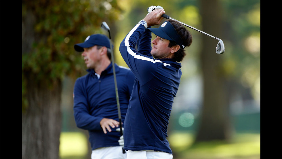 U.S. players Matt Kuchar and Bubba Watson hit shots on the practice ground Thursday.