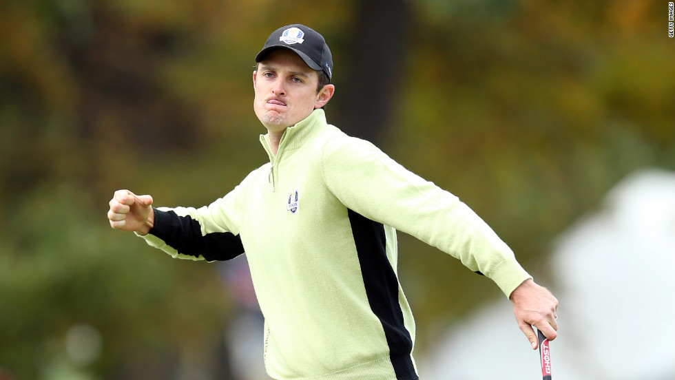 Justin Rose of Europe celebrates on the fourth hole after a long putt at the 39th Ryder Cup Friday at Medinah Country Club in Medinah, Illinois.