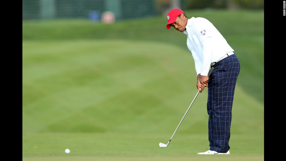 American golfer Tiger Woods chips on the first hole.