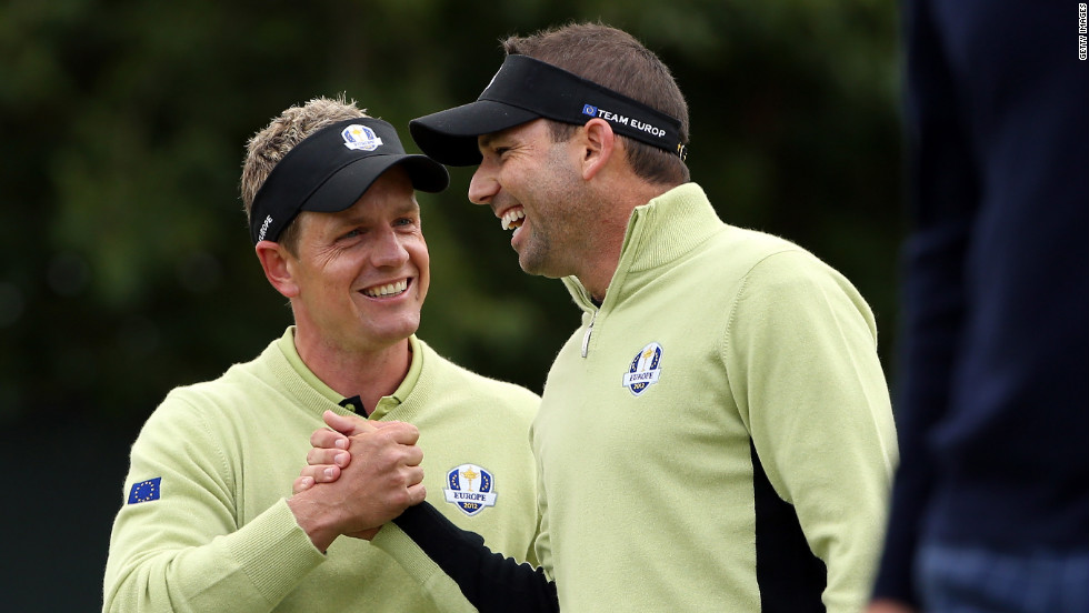 Luke Donald and Sergio Garcia of Europe celebrate on the fifth green on Friday. 