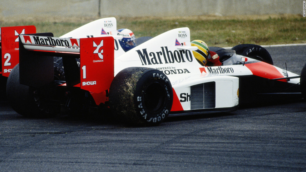 Prost and Senna (No.1) clash at the Japanese Grand Prix at Suzuka in 1989. Prost clinched the title after the Brazilian was controversially disqualified after winning the race.   