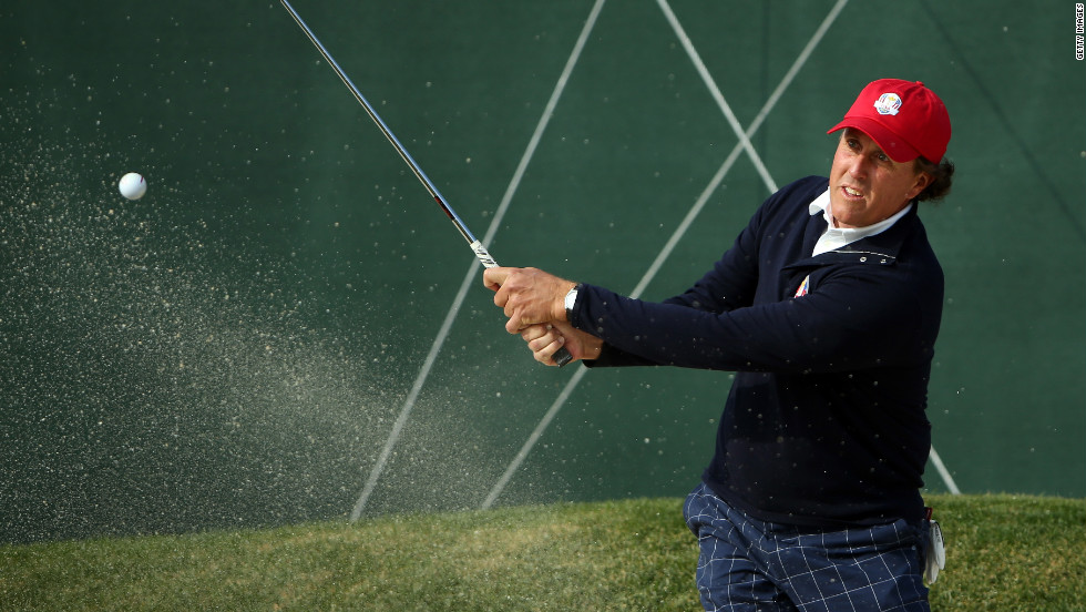 Phil Mickelson plays a bunker shot on 10th tenth hole on Friday.
