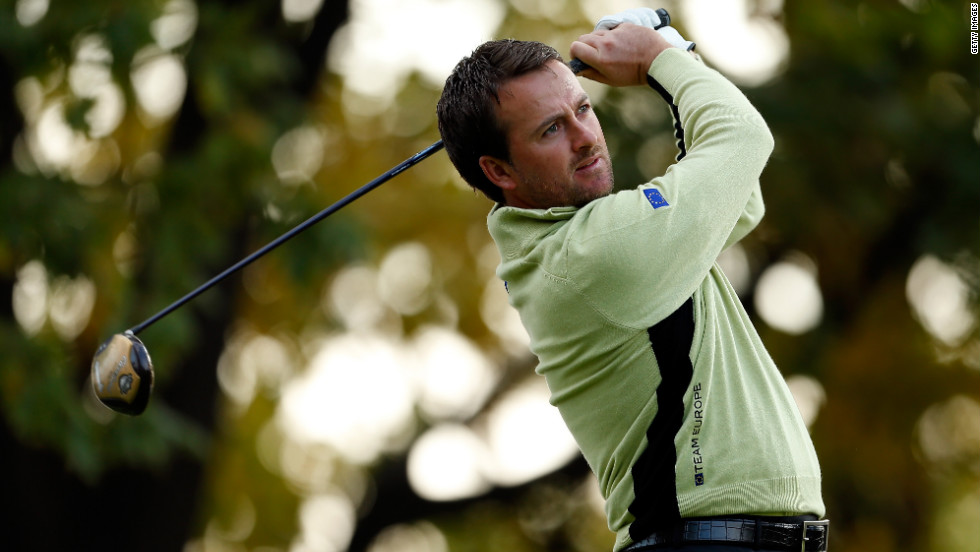 Graeme McDowell of Europe watches a shot during the Morning Foursome matches of the Ryder Cup on Friday.