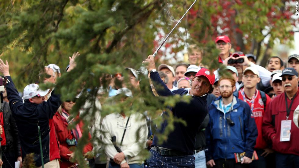 Phil Mickelson hits a shot on the fifth hole on Friday.