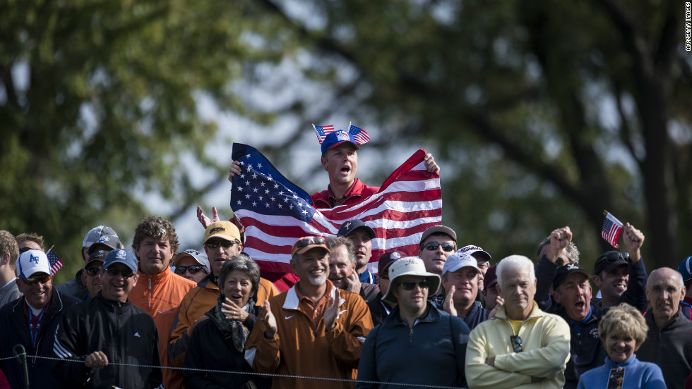 Fans watch during the morning foursome matches Friday at the Medinah Country Club.