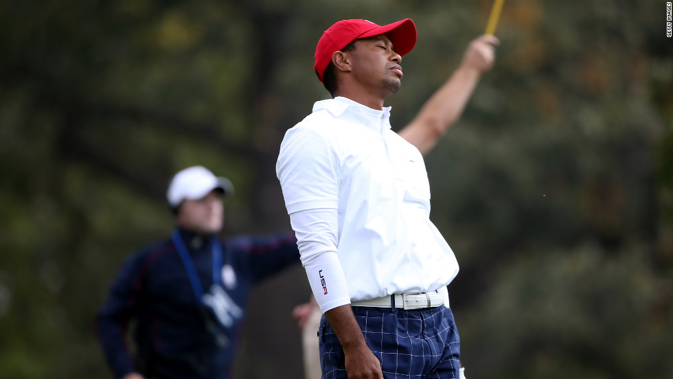 Tiger Woods of the USA reacts to a poor tee shot on the 15th hole on Friday.