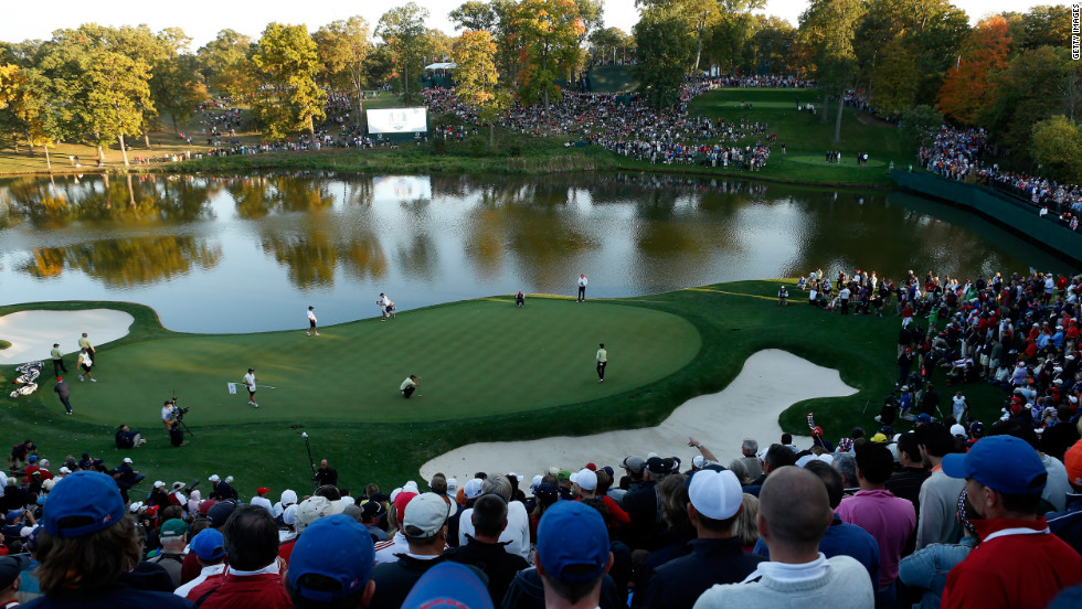 Fans watch the play on the 17th hole on Friday.