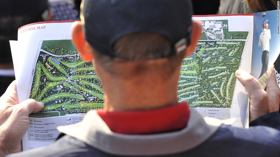 A fan looks at a map on Saturday.