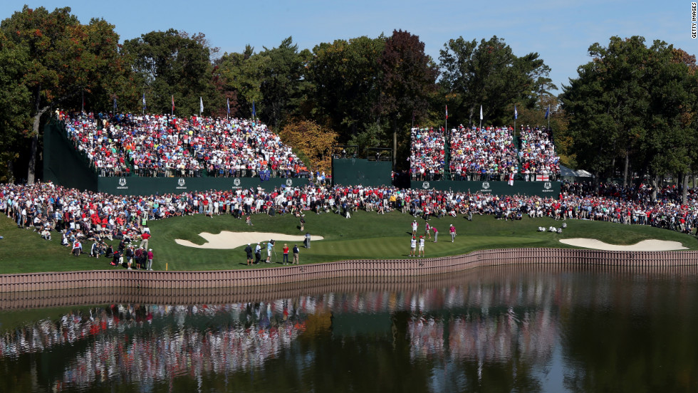 A crowd gathers at the 17th green on day two of the competition.