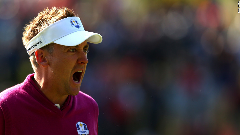 Ian Poulter of Europe celebrates after holing a putt on the 12th hole Saturday.