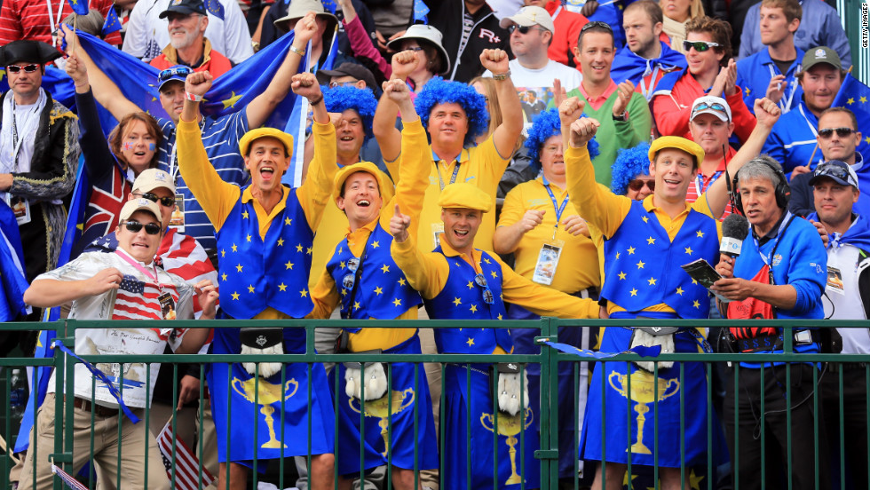 European fans cheer at the start of the final day of play at the 39th Ryder Cup on Sunday.
