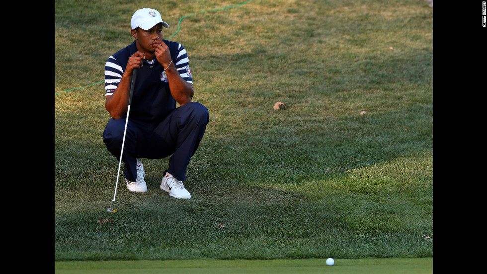 Tiger Woods waits on a hole during Sunday&#39;s singles matches.