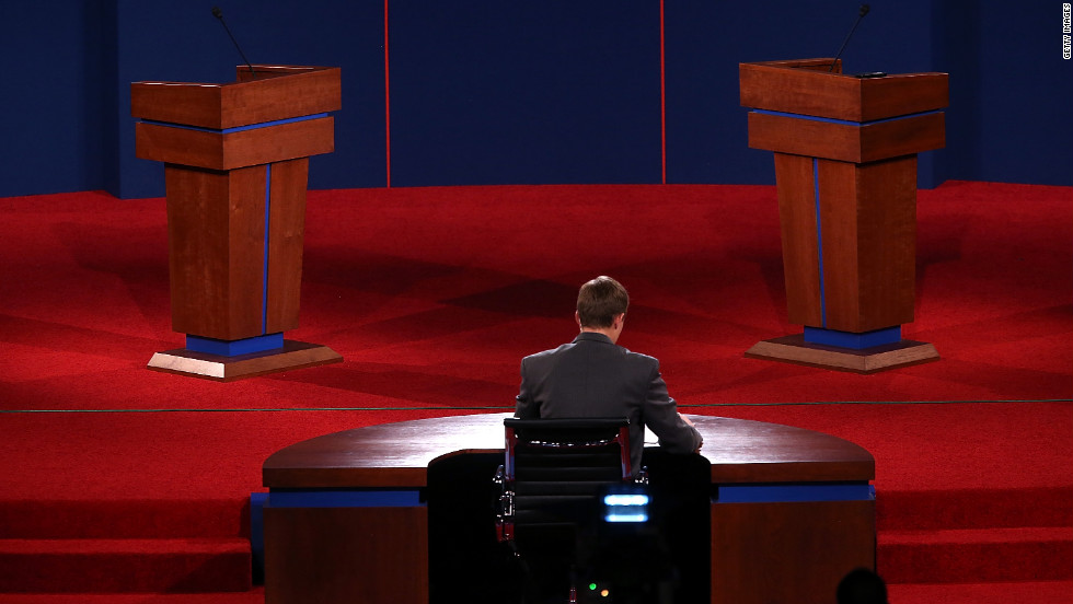 University of Denver student Sam Garry sits at the moderator&#39;s desk before a presidential debate dress rehearsal at the University of Denver on Tuesday, October 2. 