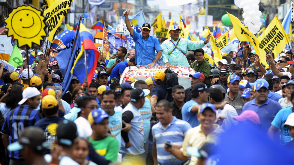 Capriles greets supporters during a campaign rally in Puerto Ayacucho on Monday.