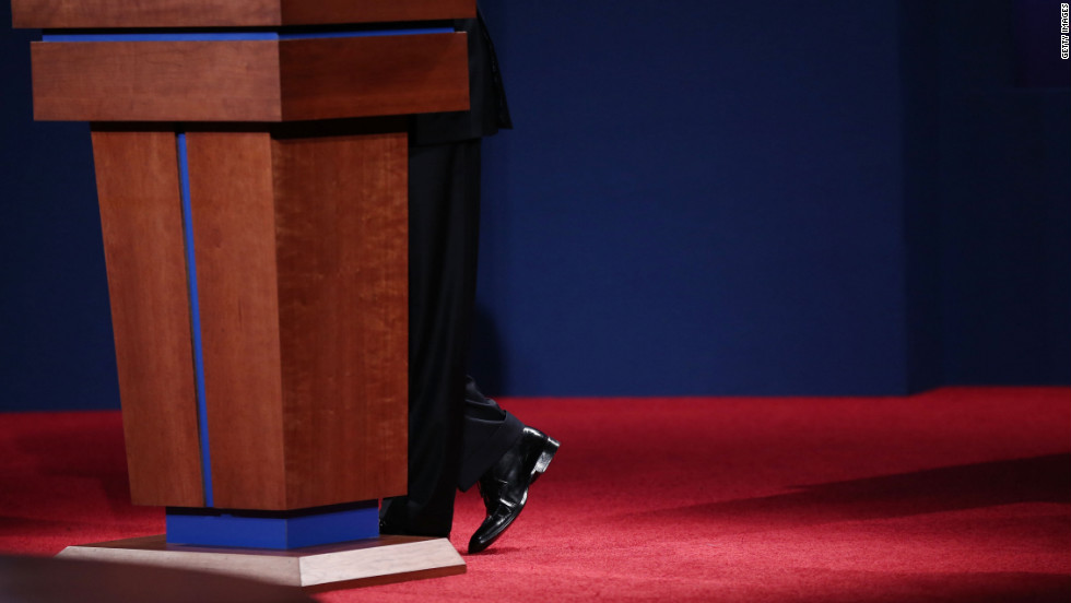 Obama stands at the podium as he speaks during the debate on Wednesday.