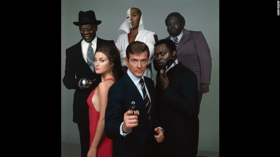 The cast of &quot;Live and Let Die,&quot; in 1973, from front center, clockwise, Roger Moore as Bond, Jane Seymour as Solitaire, Julius Harris as Tee Hee, Geoffrey Holder as Baron Samedi, Earl Jolly Brown as Whisper and Yaphet Kotto as Kananga. 