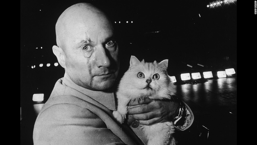  Donald Pleasence  in character as Ernst Stavro Blofeld, holding a white cat on the set of &quot;You Only Live Twice,&quot; in November 1966. 