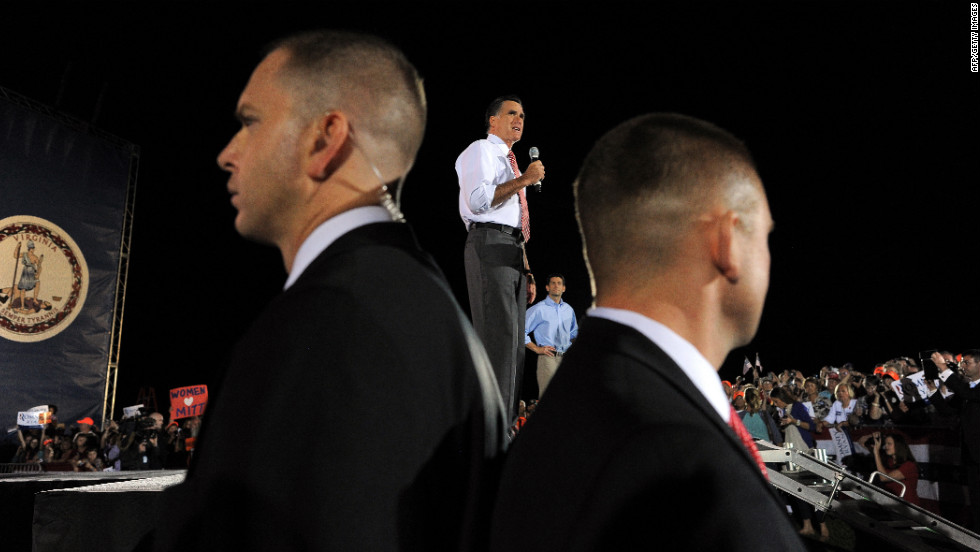 Romney speaks in Fishersville, Virginia, as Secret Service members keep guard on Thursday, October 4. A day after the first presidential debate in Denver, Romney headed to Virginia to continue campaigning.