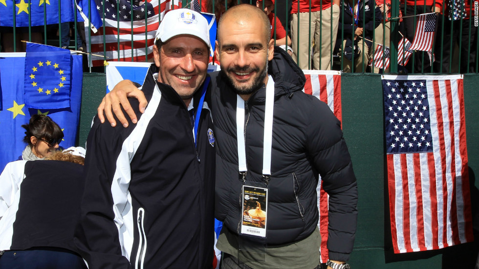Guardiola is pictured here with fellow Spaniard Jose Maria Olzabal at the Ryder Cup after Europe produced a remarkable comeback to win the tournament at Medinah in the U.S.