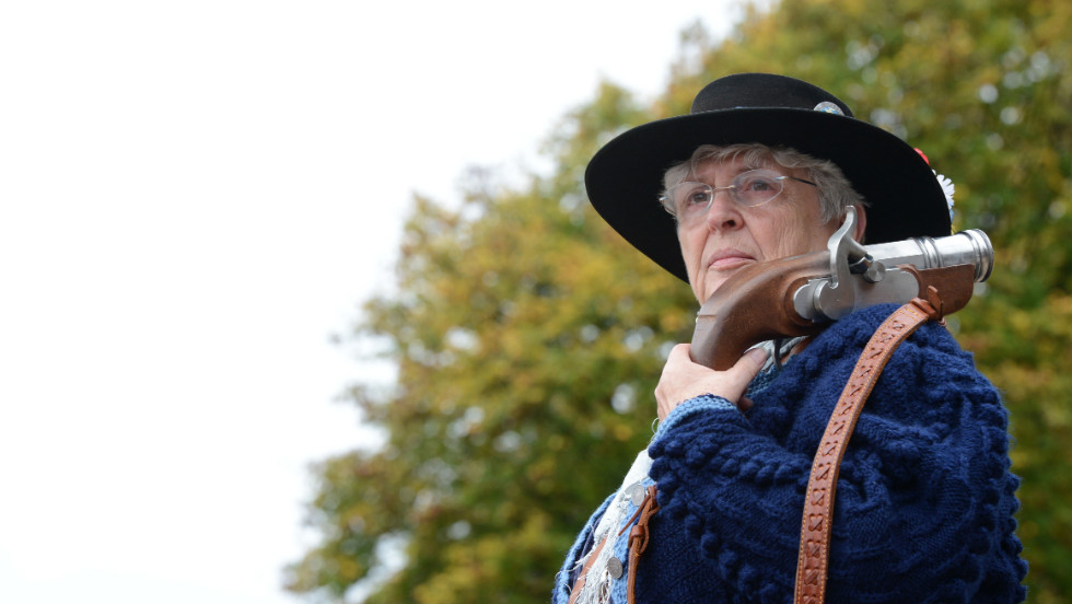 A Bavarian riflewoman waits before the salute on Sunday.