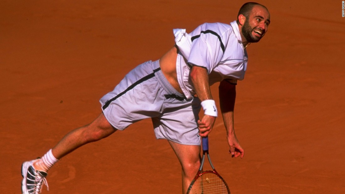 Agassi won his fourth major at the French Open in 1999 after coming back from two sets behind to beat Andrei Medvedev and complete a career grand slam.
