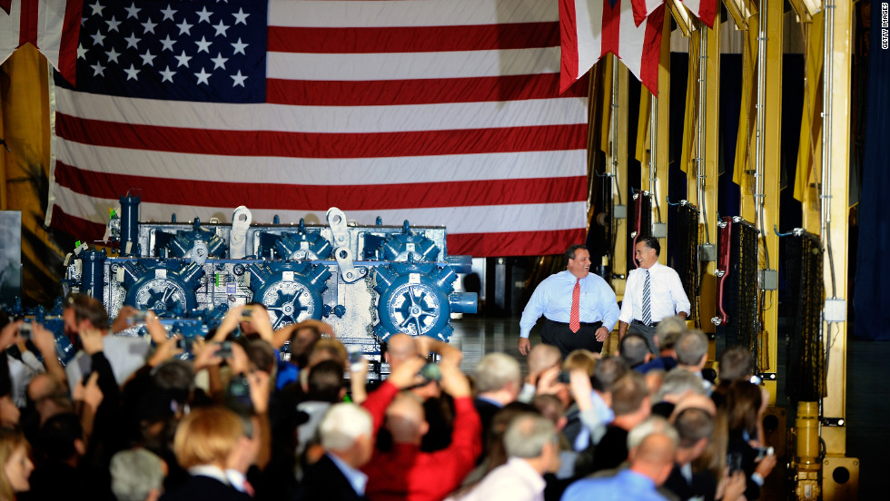 Christie, left, and Romney walk up to the stage at Ariel Corporation in Mount Vernon, Ohio, on Wednesday.