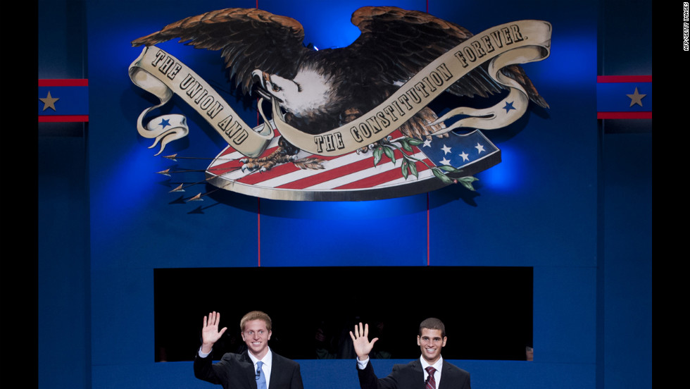 Centre College students Ben Boone, left, a stand-in for U.S. Vice President Joe Biden, and Tommy Munoz, a stand-in for Republican Vice Presidential candidate Paul Ryan, wave during a rehearsal for the vice presidential debate in Danville, Kentucky, on Wednesday.