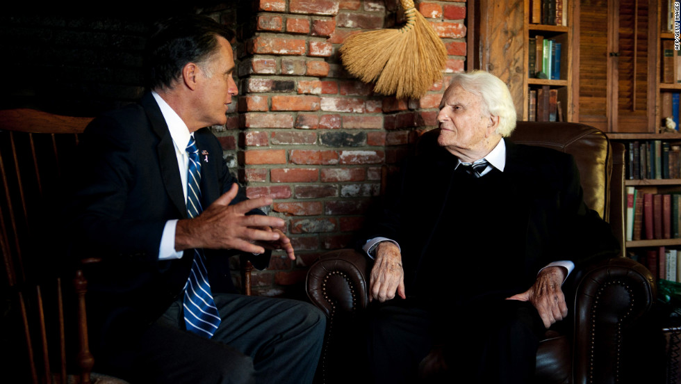 Romney, left, speaks with the Rev. Billy Graham during a visit to the Graham cabin in Montreat, North Carolina, on Thursday.