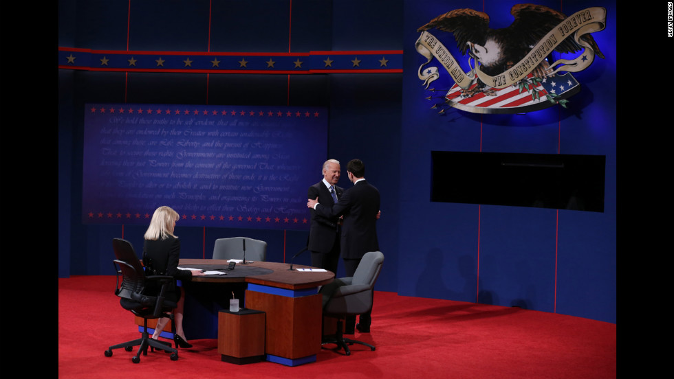 Vice President Biden greets Republican vice presidential candidate Paul Ryan as they take the stage.