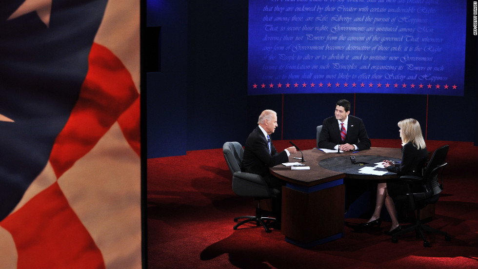 U.S. Vice President Joe Biden, left, engages in the first and only vice presidential debate on Thursday, October 11.