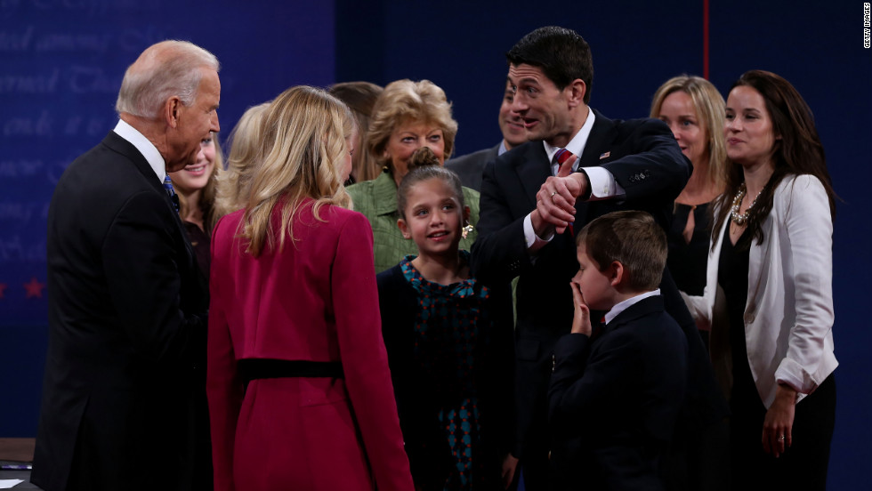 Vice President Joe Biden and Rep. Paul Ryan mingle with their families after the debate.