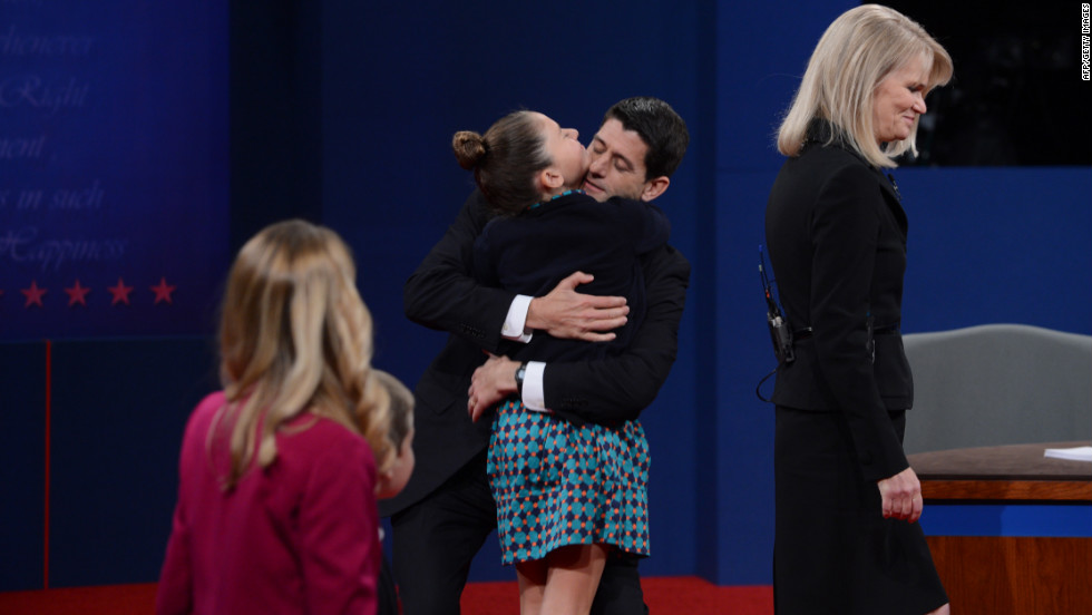 Vice presidential candidate Ryan greets family following his debate with Vice President Biden.