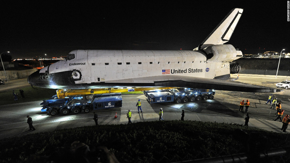 Computer-controlled transporters help move Endeavour across Los Angeles International Airport early Friday.