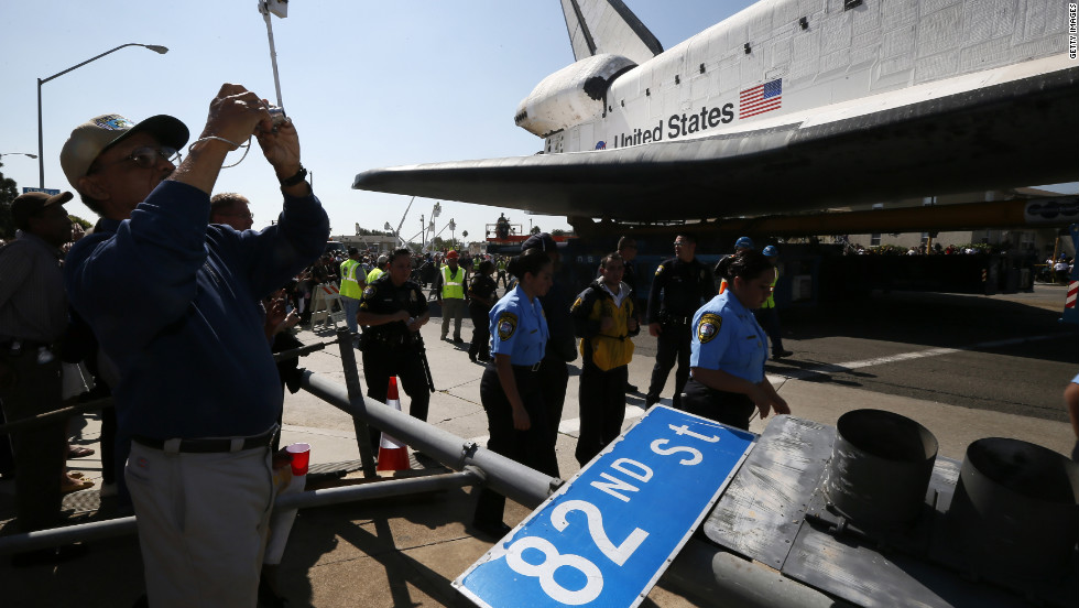 Endeavour passes a downed road sign.