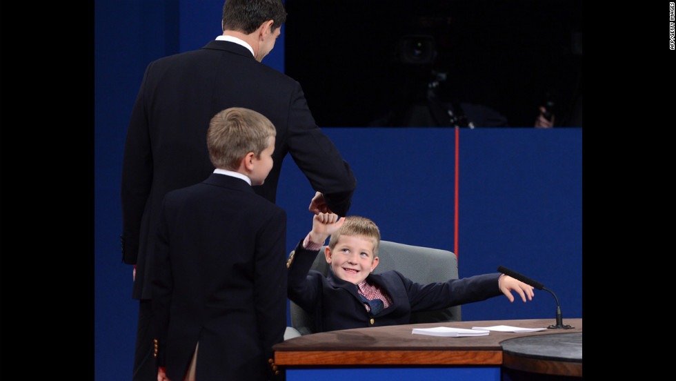 Ryan greets his son Sam after the debate in Danville, Kentucky, on Thursday.