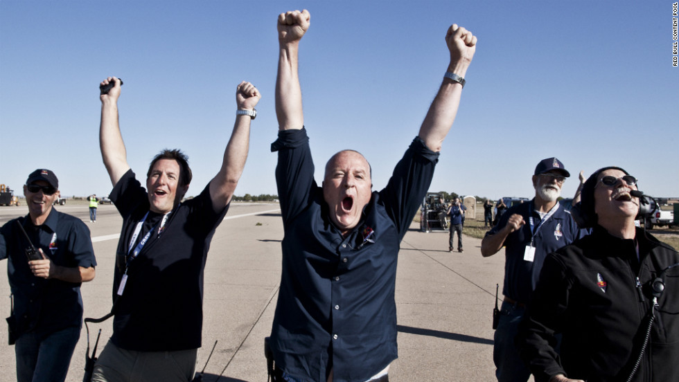 Crew members celebrate Sunday&#39;s successful launch. Baumgartner hoped to be the first person to break the sound barrier without the protection of a vehicle.