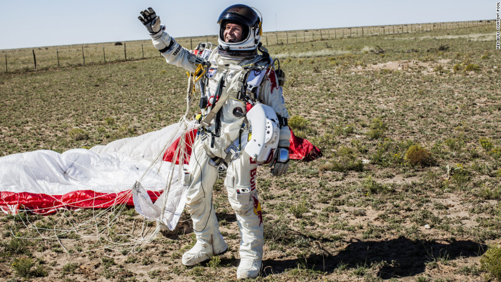 Baumgartner celebrates after successfully completing the final manned flight for Red Bull Stratos mission.