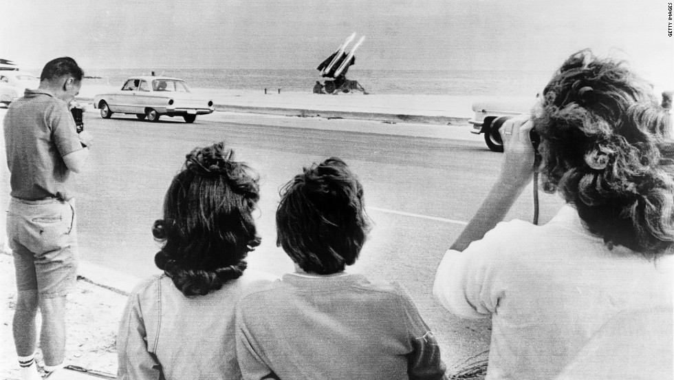 Onlookers gather on George Smathers Beach in Key West, Florida, to see the U.S. Army&#39;s Hawk anti-aircraft missiles positioned there during the Cuban missile crisis.