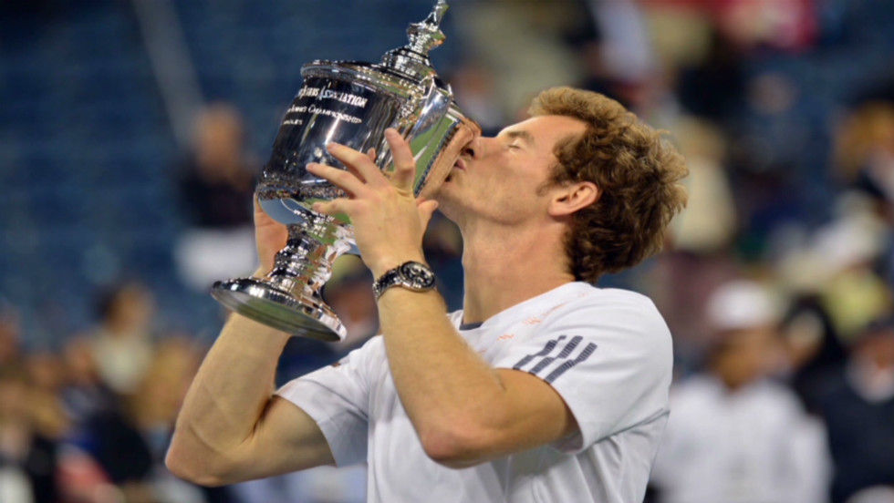 Murray&#39;s maiden grand slam triumph came after he squandered a two-set lead before edging out Djokovic in a tense decider.